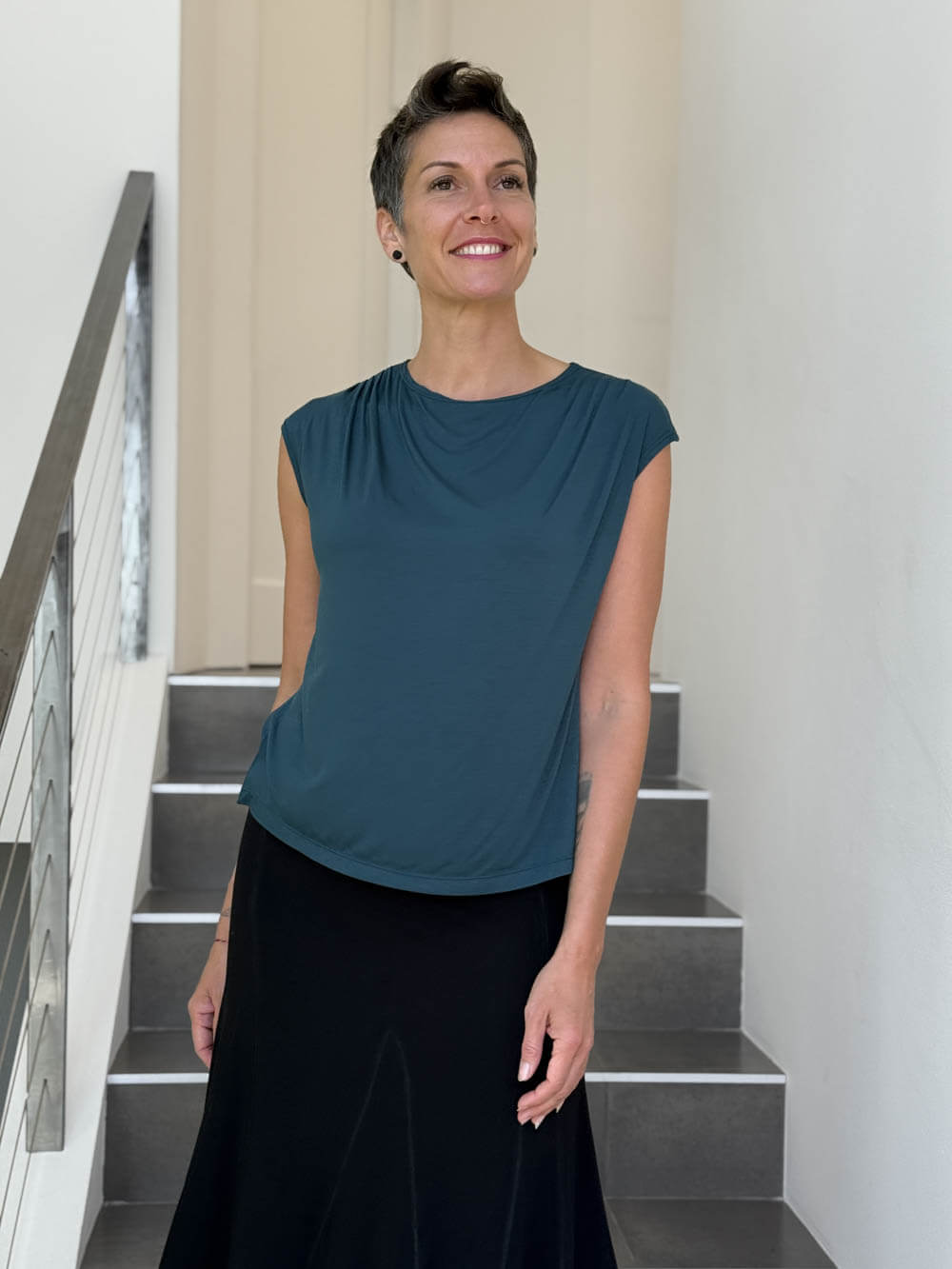 CARAUCCI Erna top in teal blue lightweight rayon jersey with cap sleeves and draped neckline #color_teal