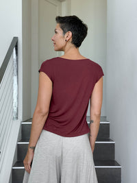 CARAUCCI Erna top in maroon lightweight rayon jersey with cap sleeves and draped neckline #color_wine
