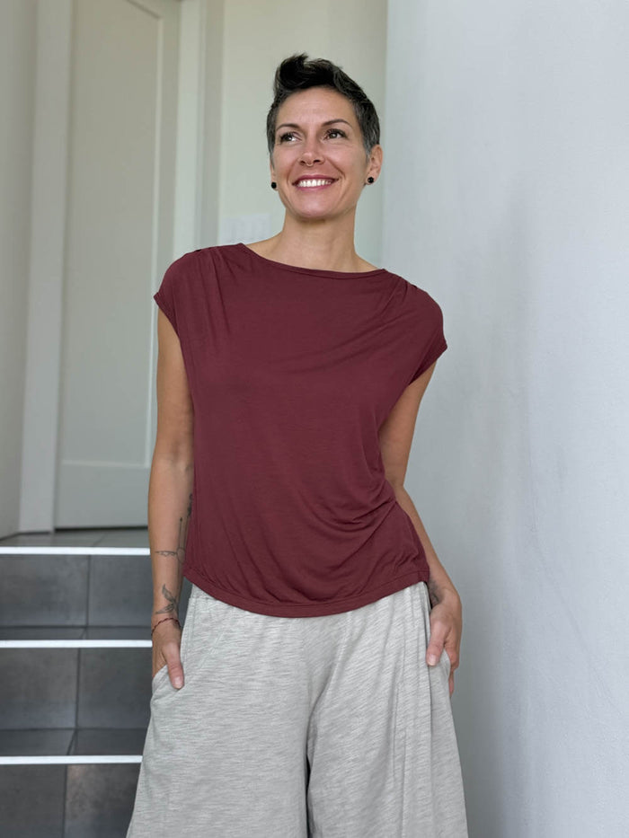 CARAUCCI Erna top in maroon lightweight rayon jersey with cap sleeves and draped neckline #color_wine