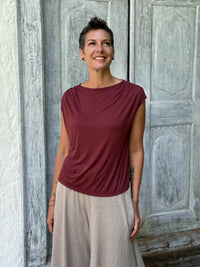 CARAUCCI Erna top in maroon lightweight rayon jersey with cap sleeves and draped neckline #color_wine