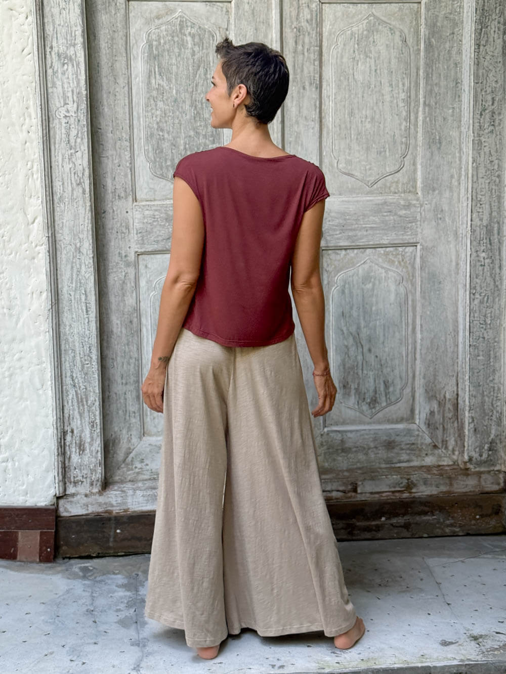 CARAUCCI Erna top in maroon lightweight rayon jersey with cap sleeves and draped neckline #color_wine