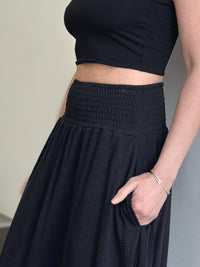 caraucci black cotton smocked waist pocket skirt #color_black