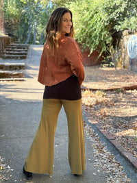 caraucci stretchy gold flare-leg pants #color_brass