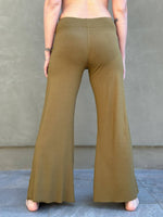 caraucci stretchy gold flare-leg pants #color_brass