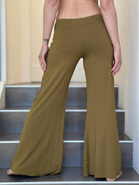 caraucci stretchy gold flare-leg pants #color_brass