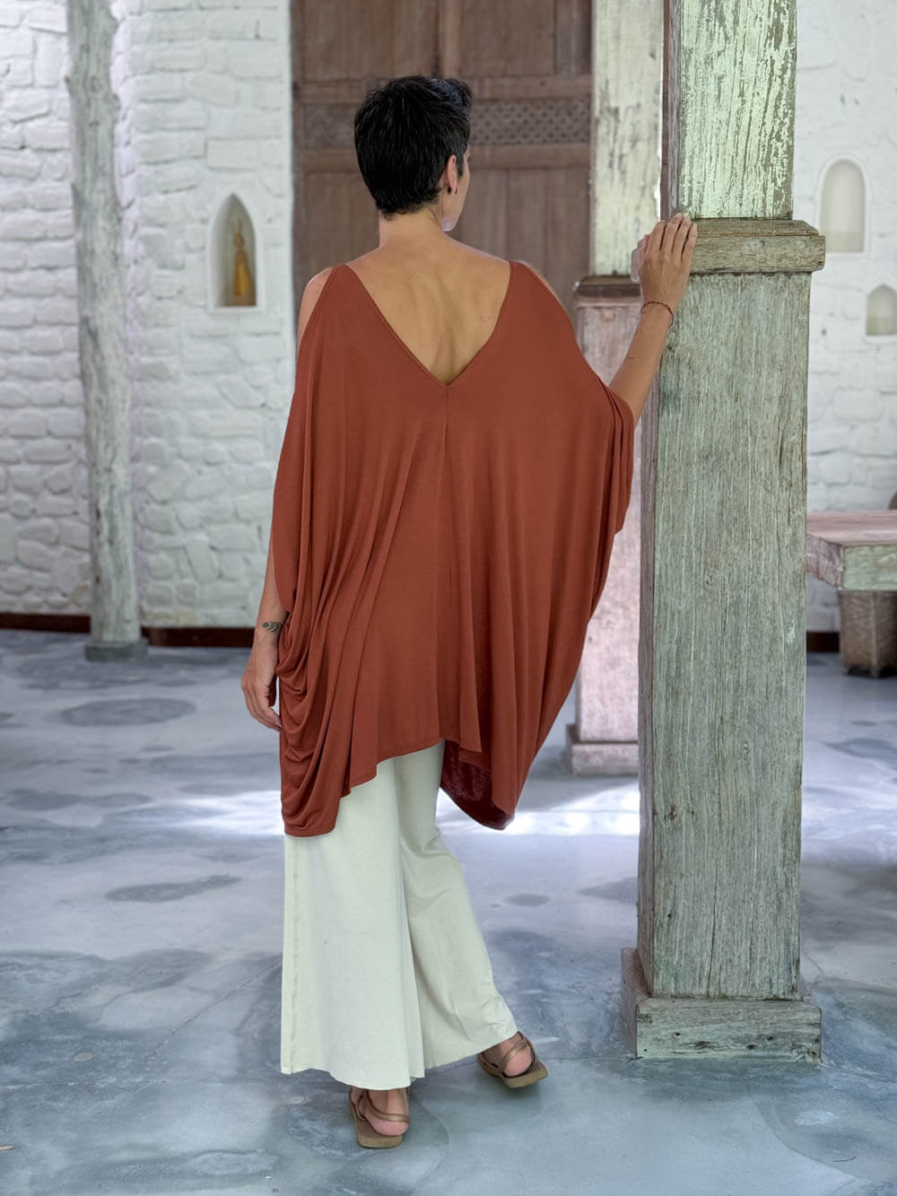 caraucci lightweight jersey draped soft orange kaftan tunic with open shoulders #color_copper
