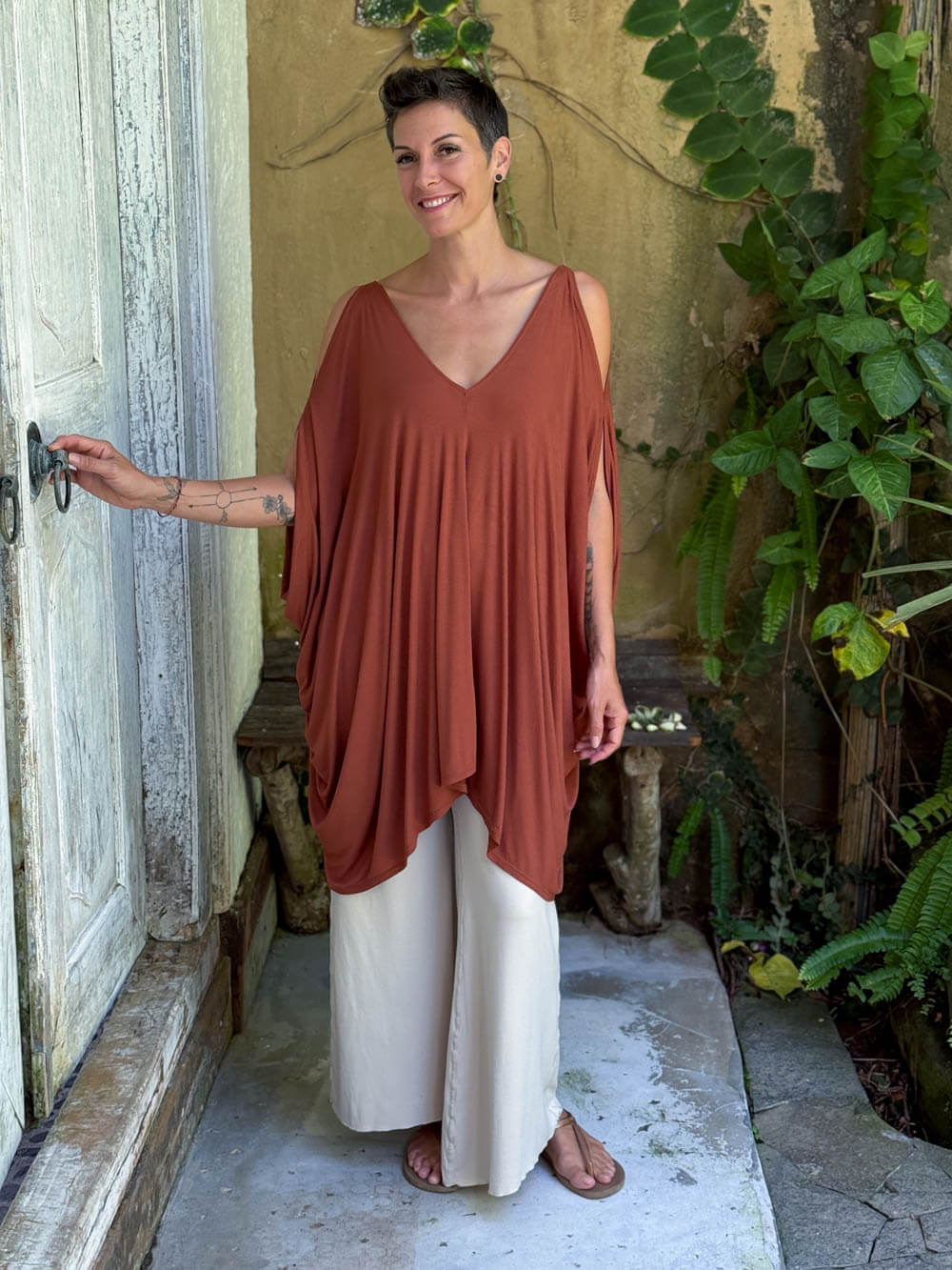 caraucci lightweight jersey draped soft orange kaftan tunic with open shoulders #color_copper