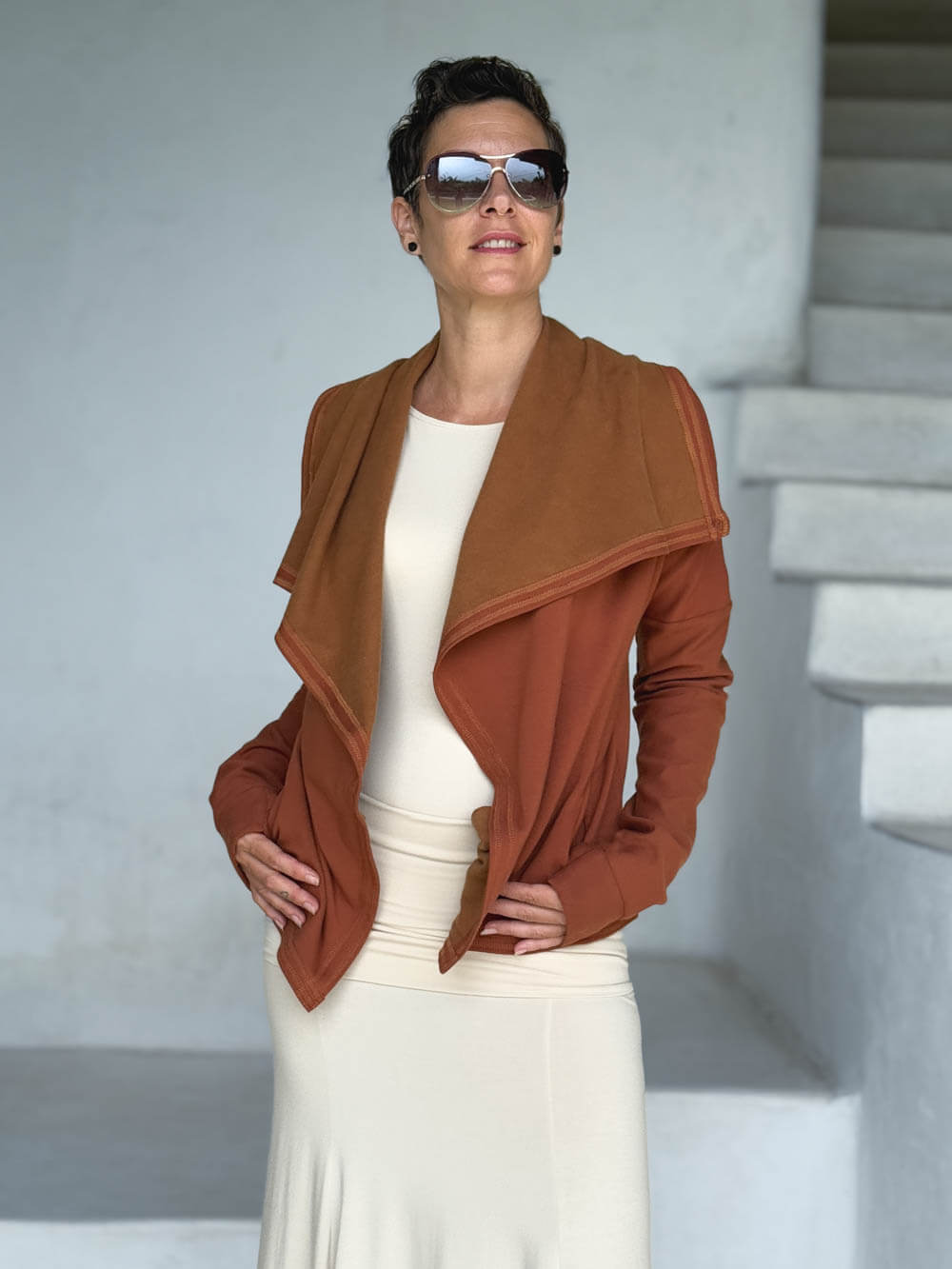caraucci orange bamboo fleece jacket, shown open with a draped shawl color with thumbholes and pockets #color_copper