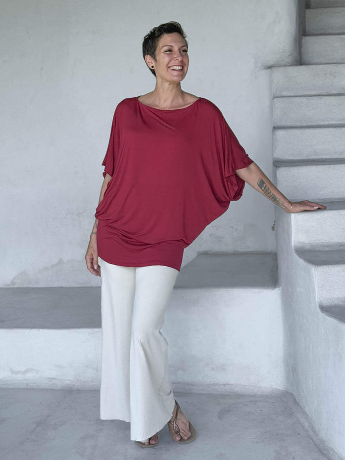 caraucci red kimono tunic worn as a tunic with cream pants #color_scarlet