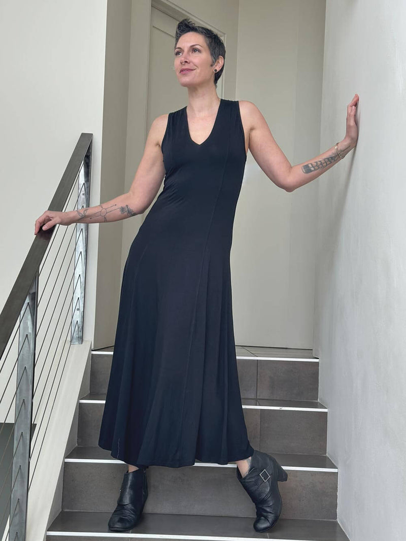 women's plant based rayon jersey stretchy black v-neck midi dress with raised detailed stitching #color_black