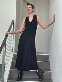 women's plant based rayon jersey stretchy black v-neck midi dress with raised detailed stitching #color_black