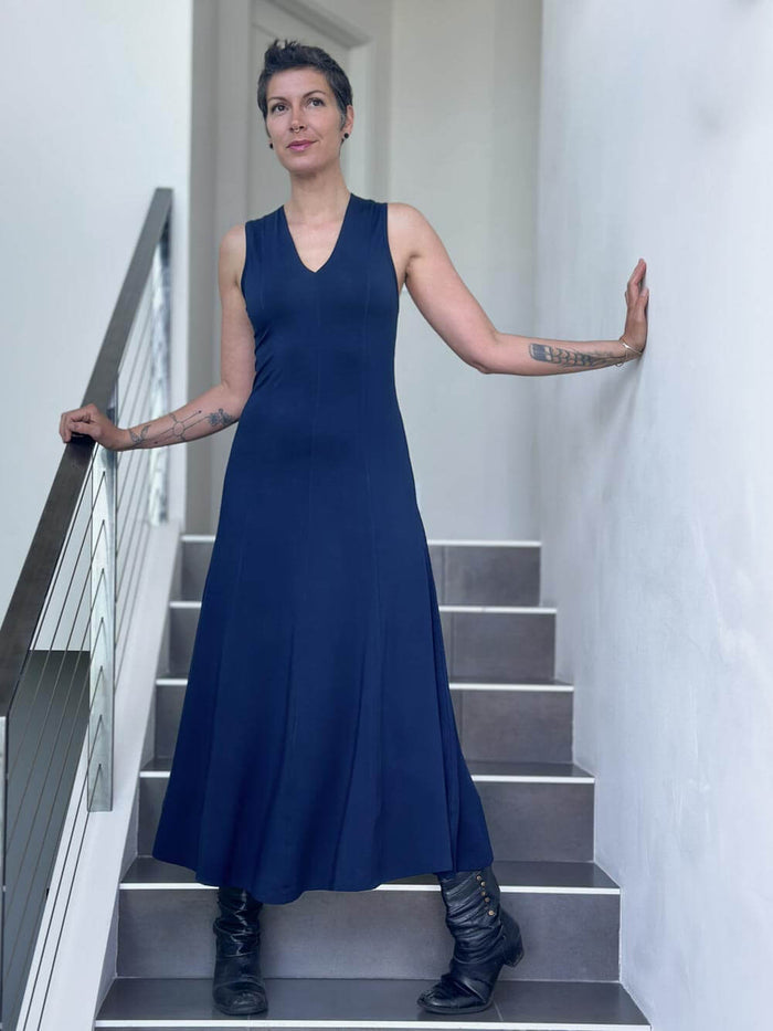 women's plant based rayon jersey stretchy navy blue v-neck midi dress with raised detailed stitching #color_navy