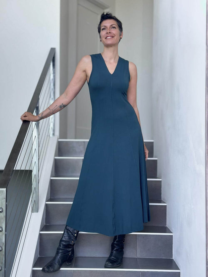 women's plant based rayon jersey stretchy teal blue v-neck midi dress with raised detailed stitching #color_teal