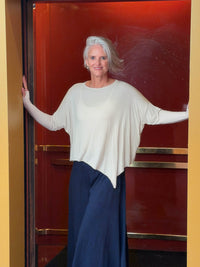 CARAUCCI asymmetrical lightweight rayon jersey cream long sleeve top #color_cream