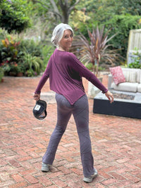 caraucci long sleeve round neck purple top with asymmetrical hemline and thumbholes #color_jam