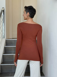 caraucci long sleeve stretchy rayon jersey orange long sleeve boat neck top #color_copper