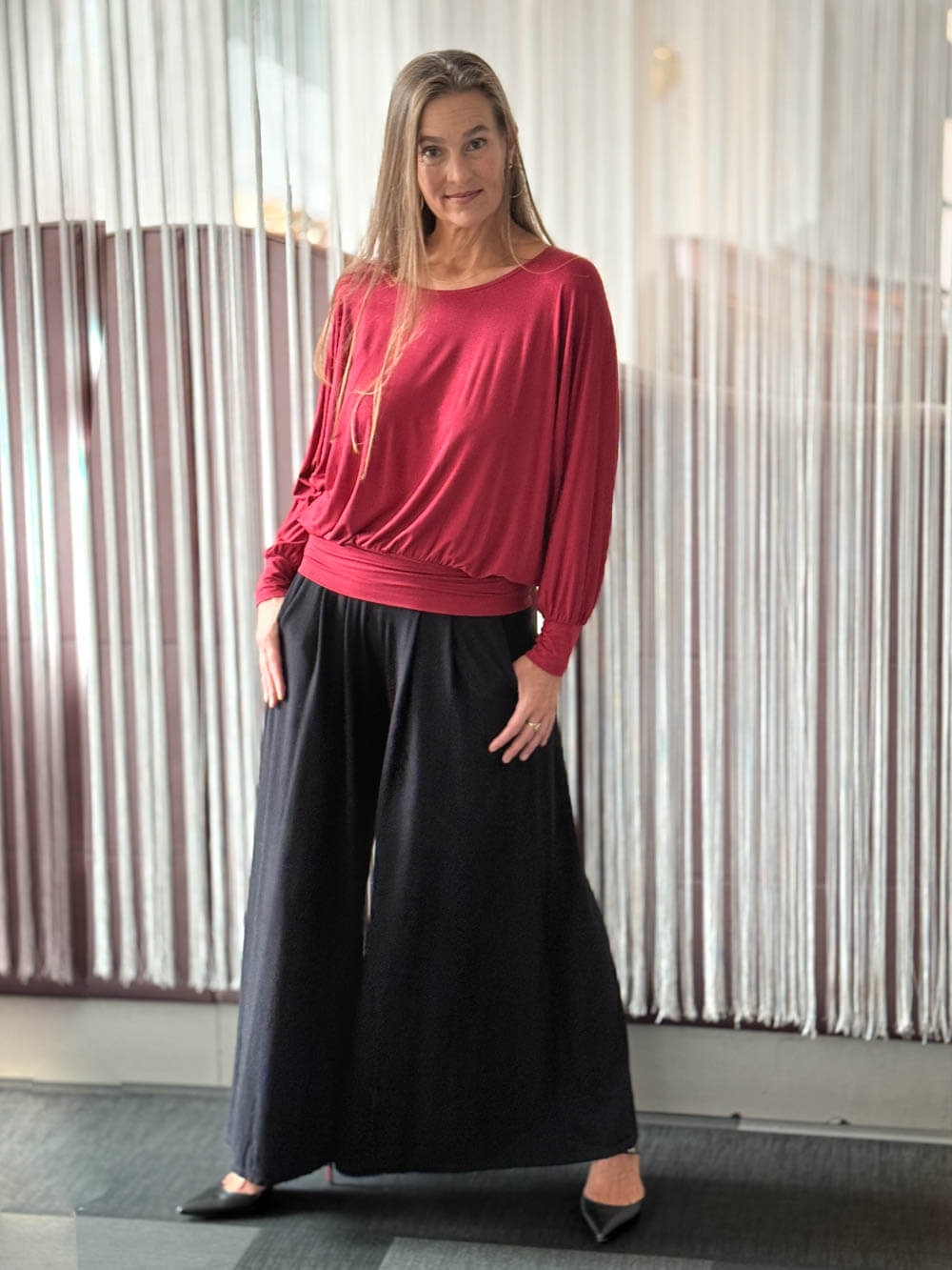 caraucci high waisted black wide leg flare pants with side pockets #color_black