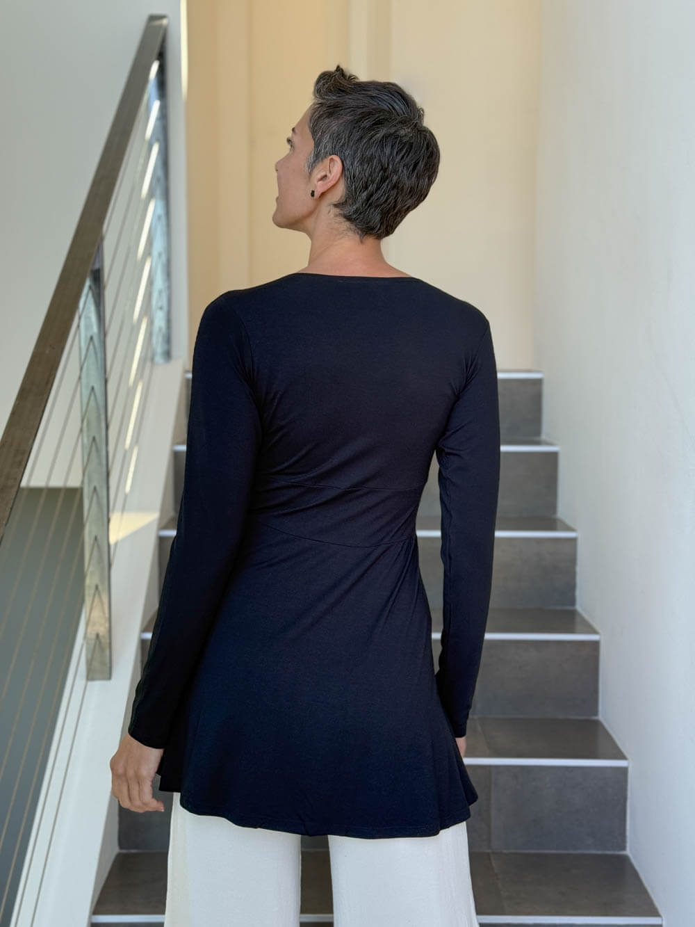 caraucci long sleeve black tunic in midweight rayon jersey with twisted front detail #color_black