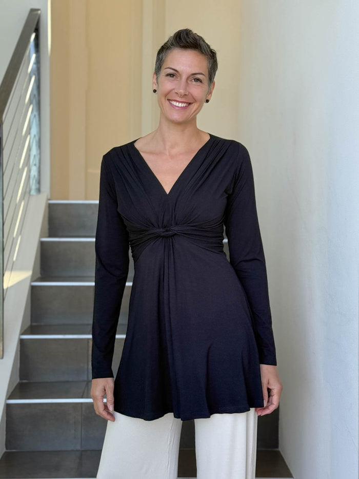 caraucci long sleeve black tunic in midweight rayon jersey with twisted front detail #color_black