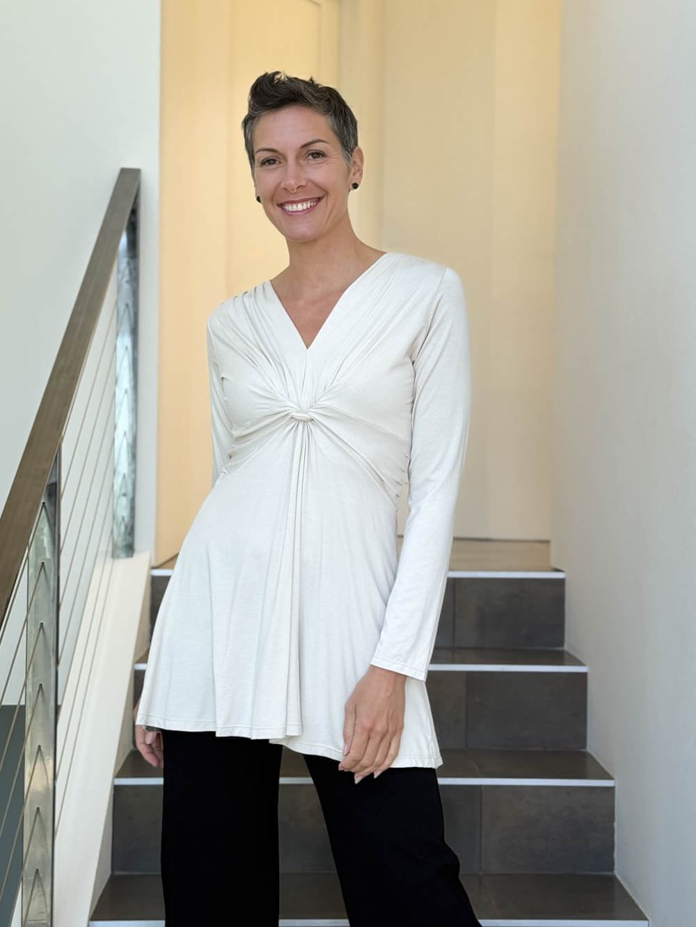 caraucci long sleeve cream tunic in midweight rayon jersey with twisted front detail #color_cream