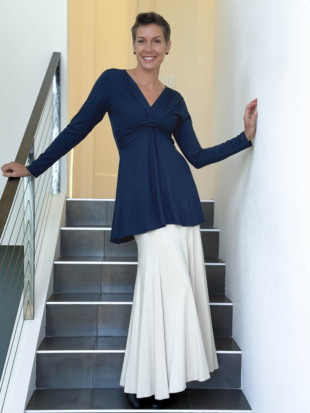 caraucci long sleeve navy blue tunic in midweight rayon jersey with twisted front detail #color_navy
