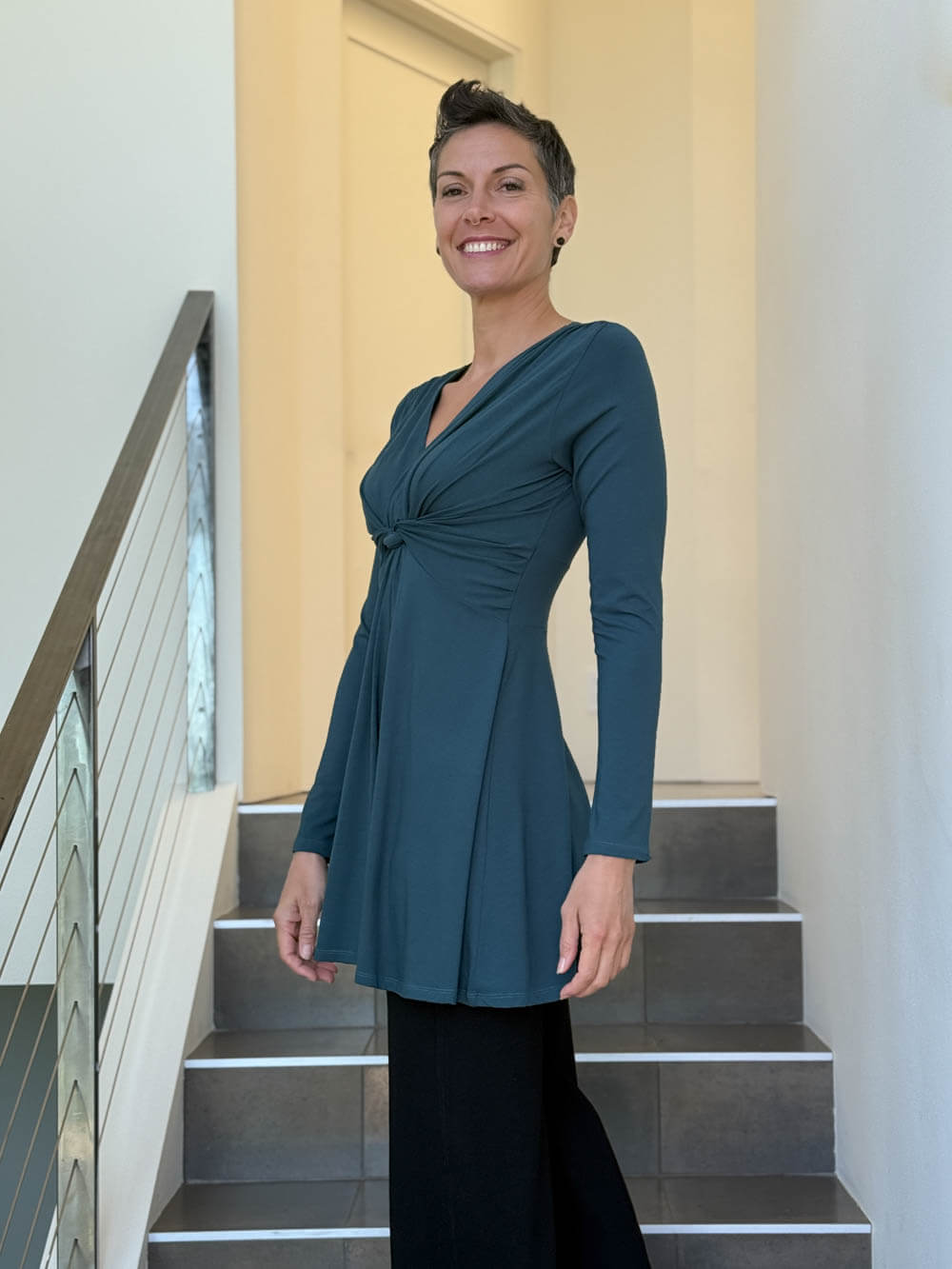 caraucci long sleeve teal blue tunic in midweight rayon jersey with twisted front detail #color_teal