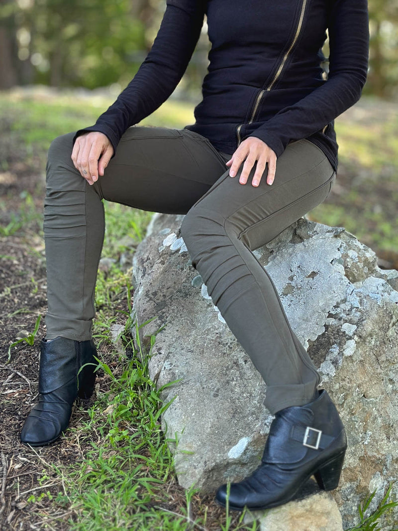 women's army green bamboo pants with raised stitch details and 2 zipper pockets #color_forest