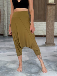 caraucci draped earthy brass harem style movement pants with soft waistband and cropped silhouette #color_brass