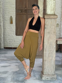 caraucci draped earthy brass harem style movement pants with soft waistband and cropped silhouette #color_brass