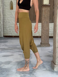 caraucci draped earthy brass harem style movement pants with soft waistband and cropped silhouette #color_brass