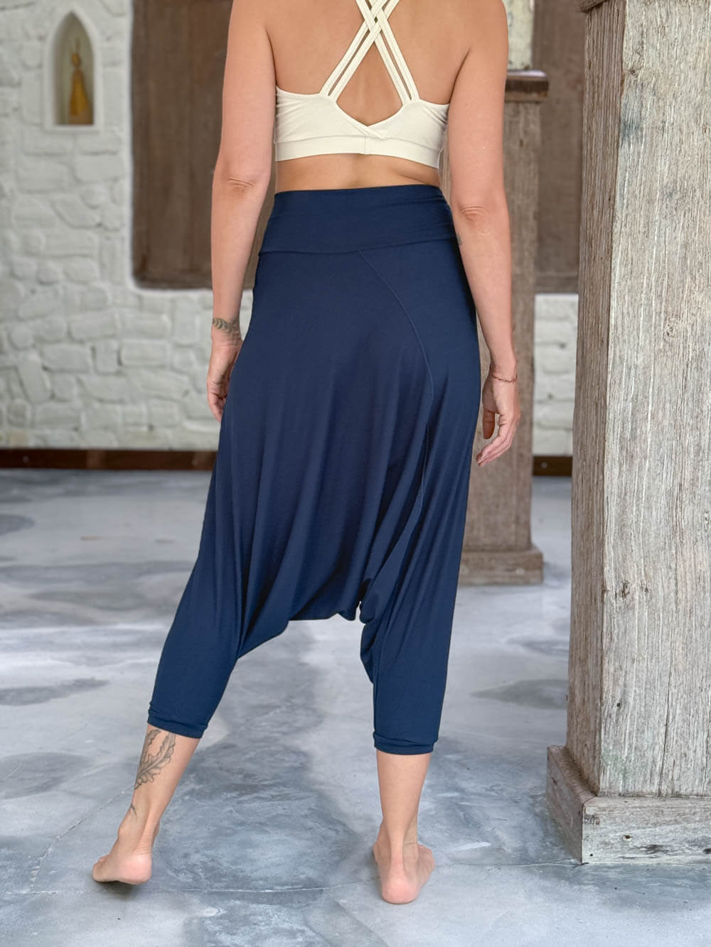 caraucci draped navy blue harem style movement pants with soft waistband and cropped silhouette #color_navy