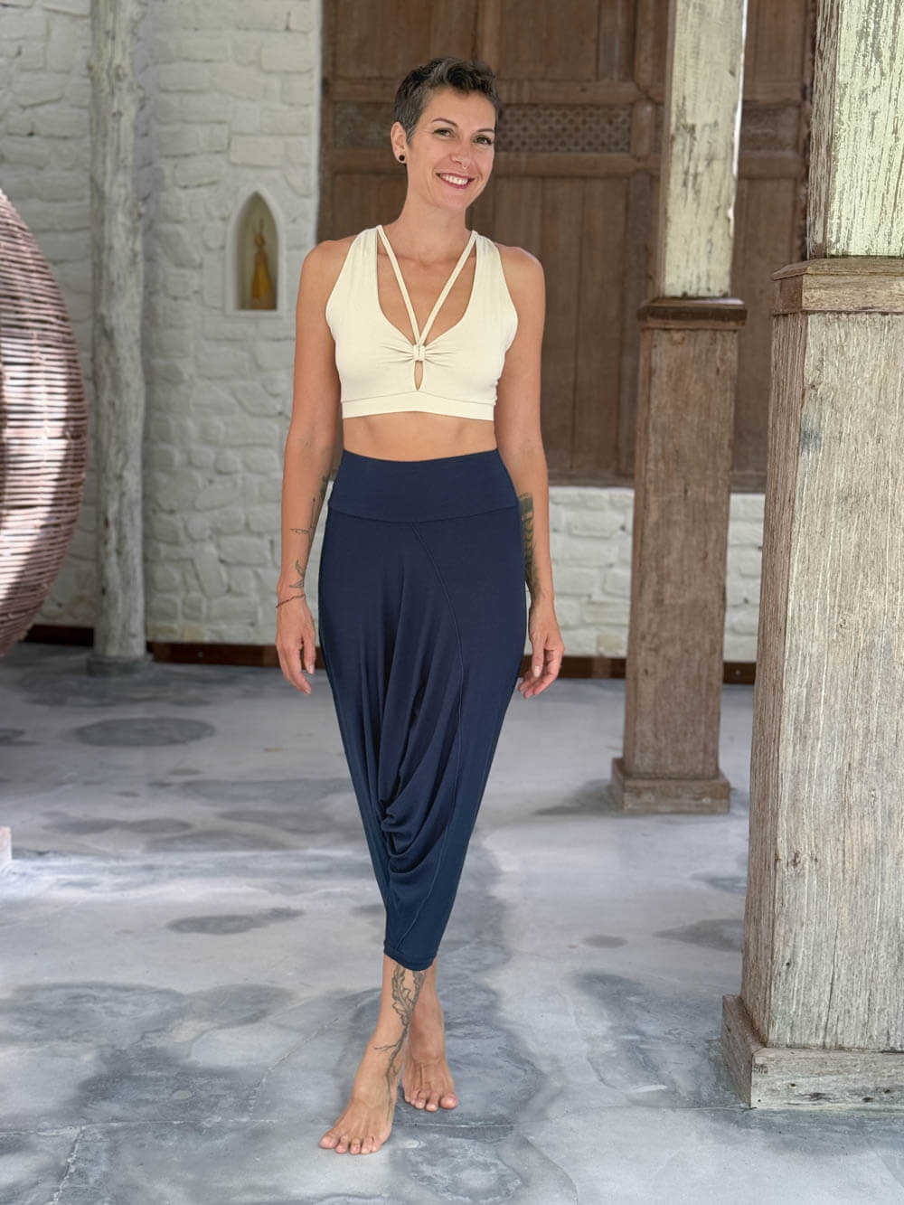 caraucci draped navy blue harem style movement pants with soft waistband and cropped silhouette #color_navy