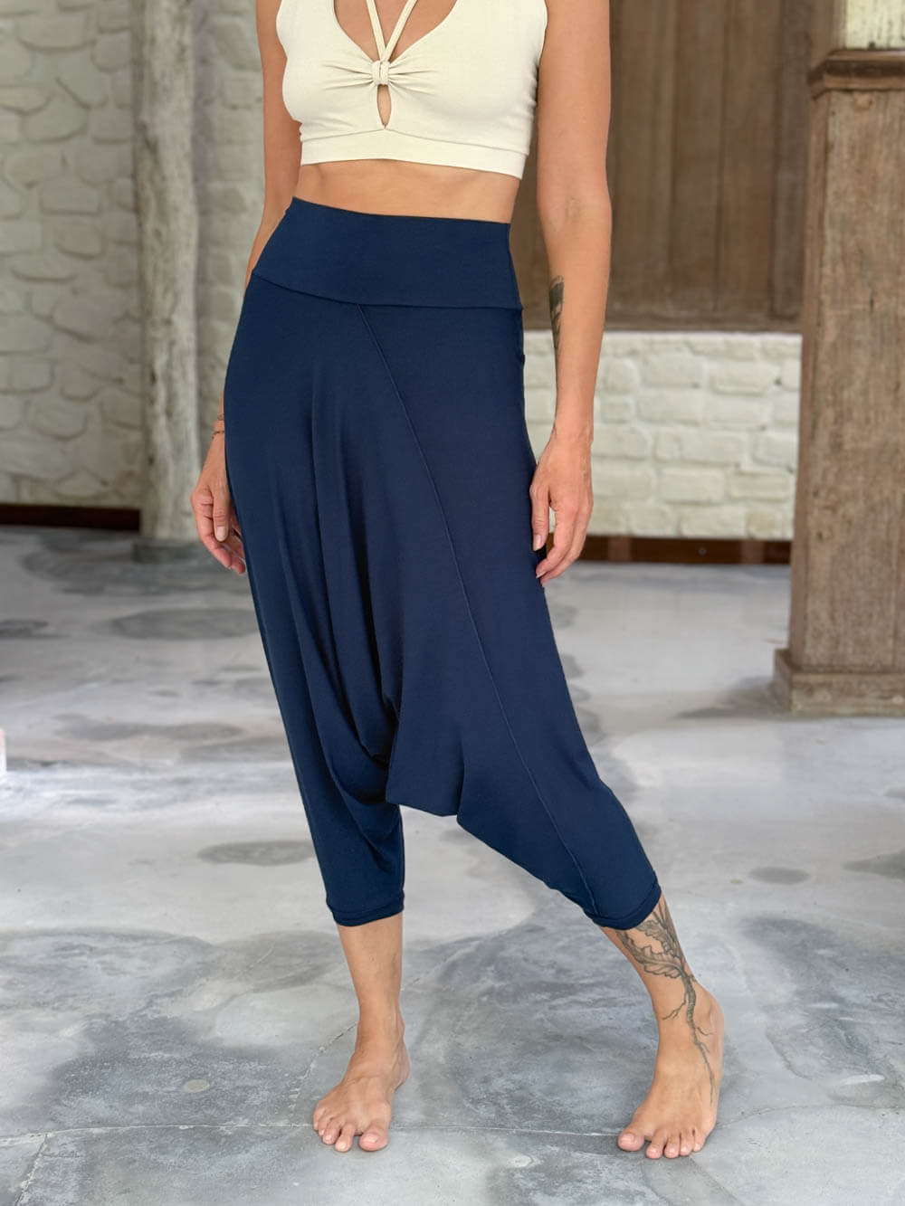 caraucci draped navy blue harem style movement pants with soft waistband and cropped silhouette #color_navy