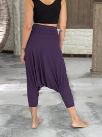 caraucci draped purple harem style movement pants with soft waistband and cropped silhouette #color_plum