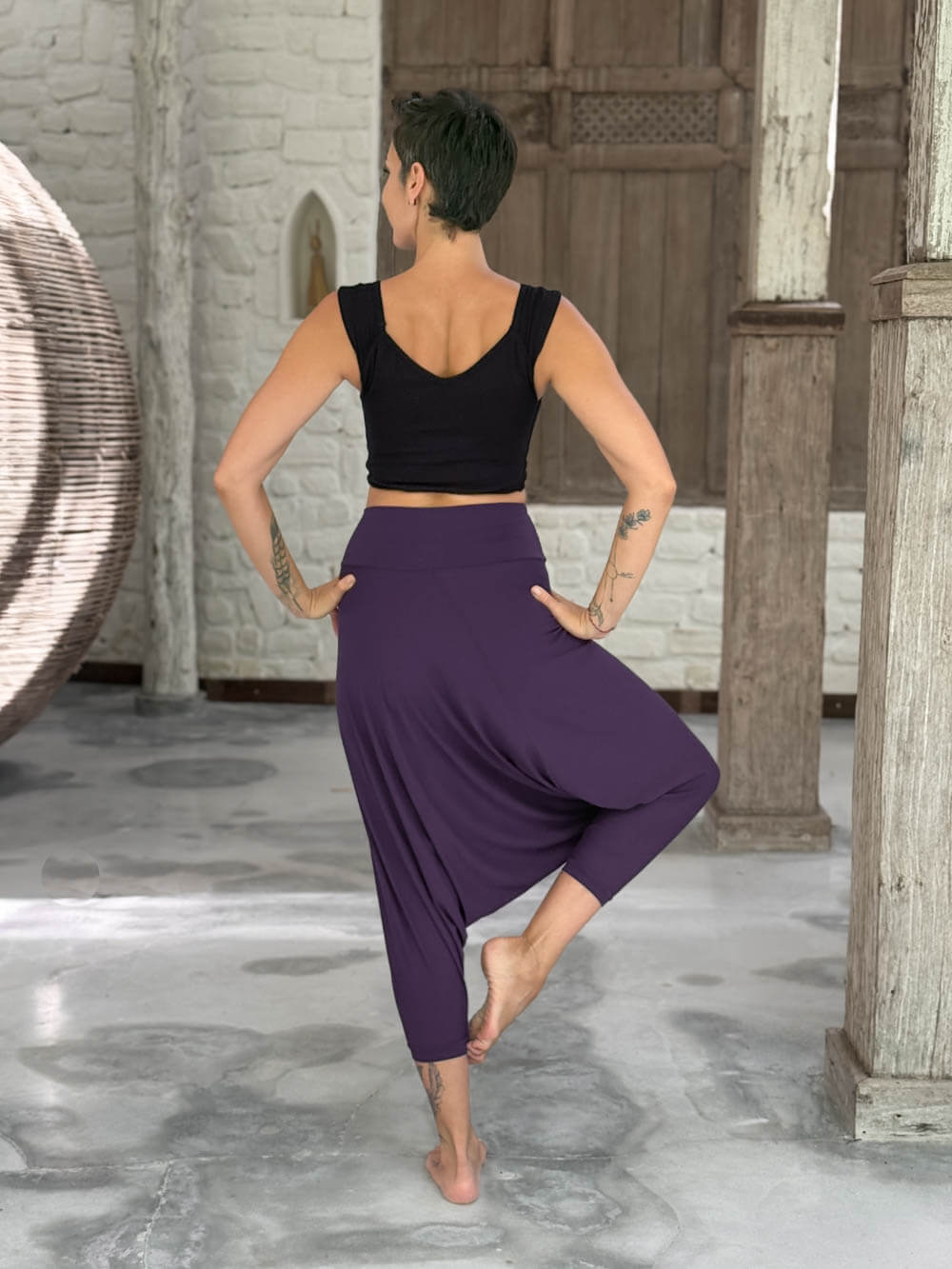 caraucci draped purple harem style movement pants with soft waistband and cropped silhouette #color_plum