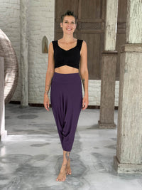caraucci draped purple harem style movement pants with soft waistband and cropped silhouette #color_plum