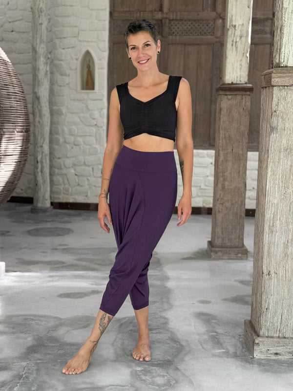 caraucci draped purple harem style movement pants with soft waistband and cropped silhouette #color_plum