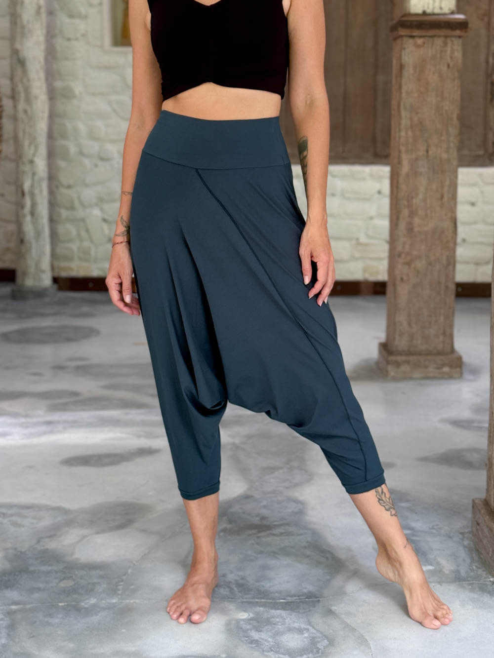 caraucci draped teal blue harem style movement pants with soft waistband and cropped silhouette #color_teal