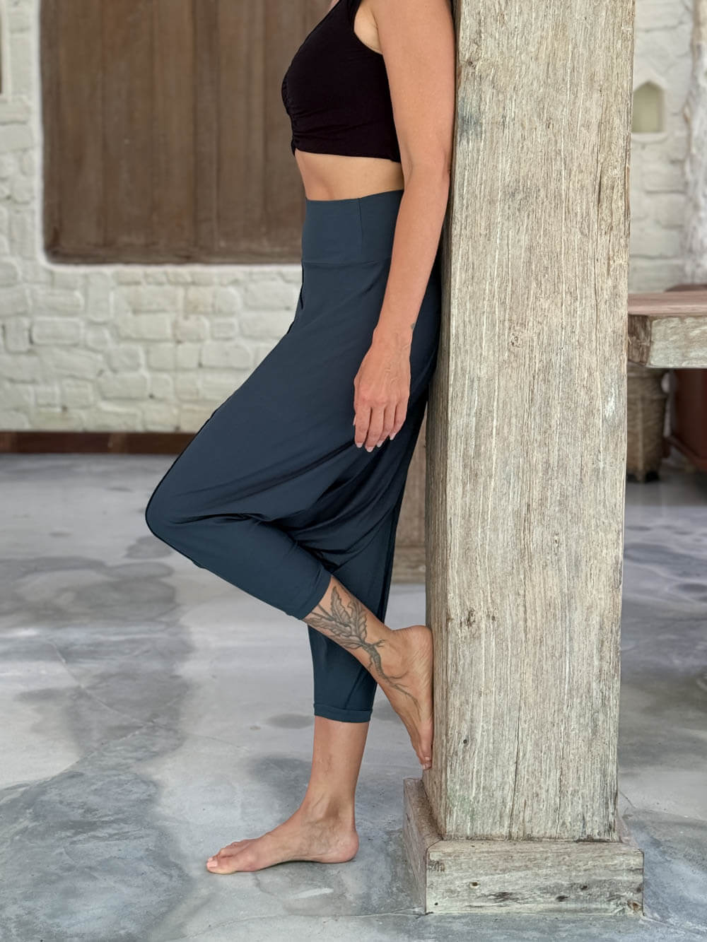 caraucci draped teal blue harem style movement pants with soft waistband and cropped silhouette #color_teal