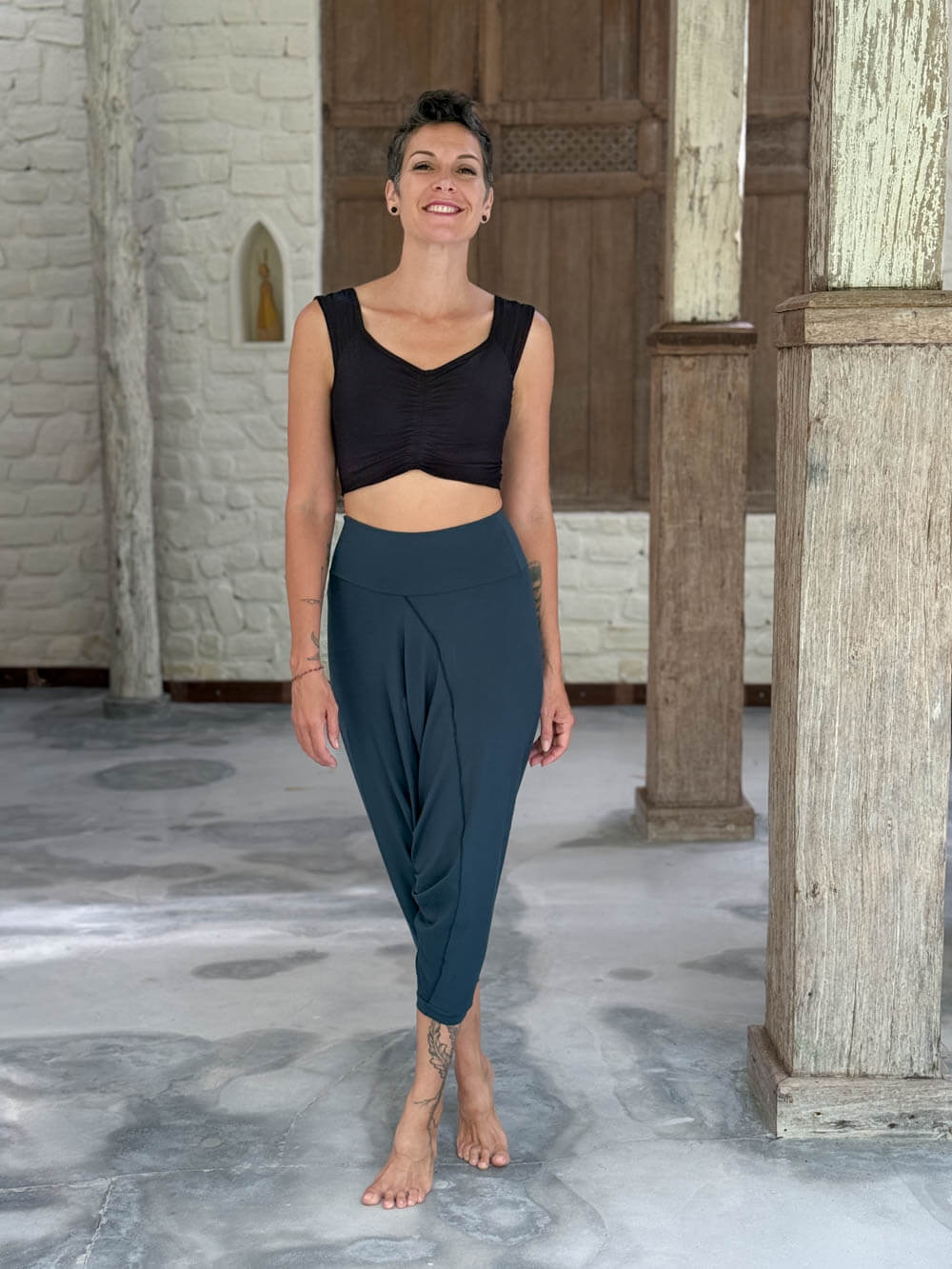 caraucci draped teal blue harem style movement pants with soft waistband and cropped silhouette #color_teal