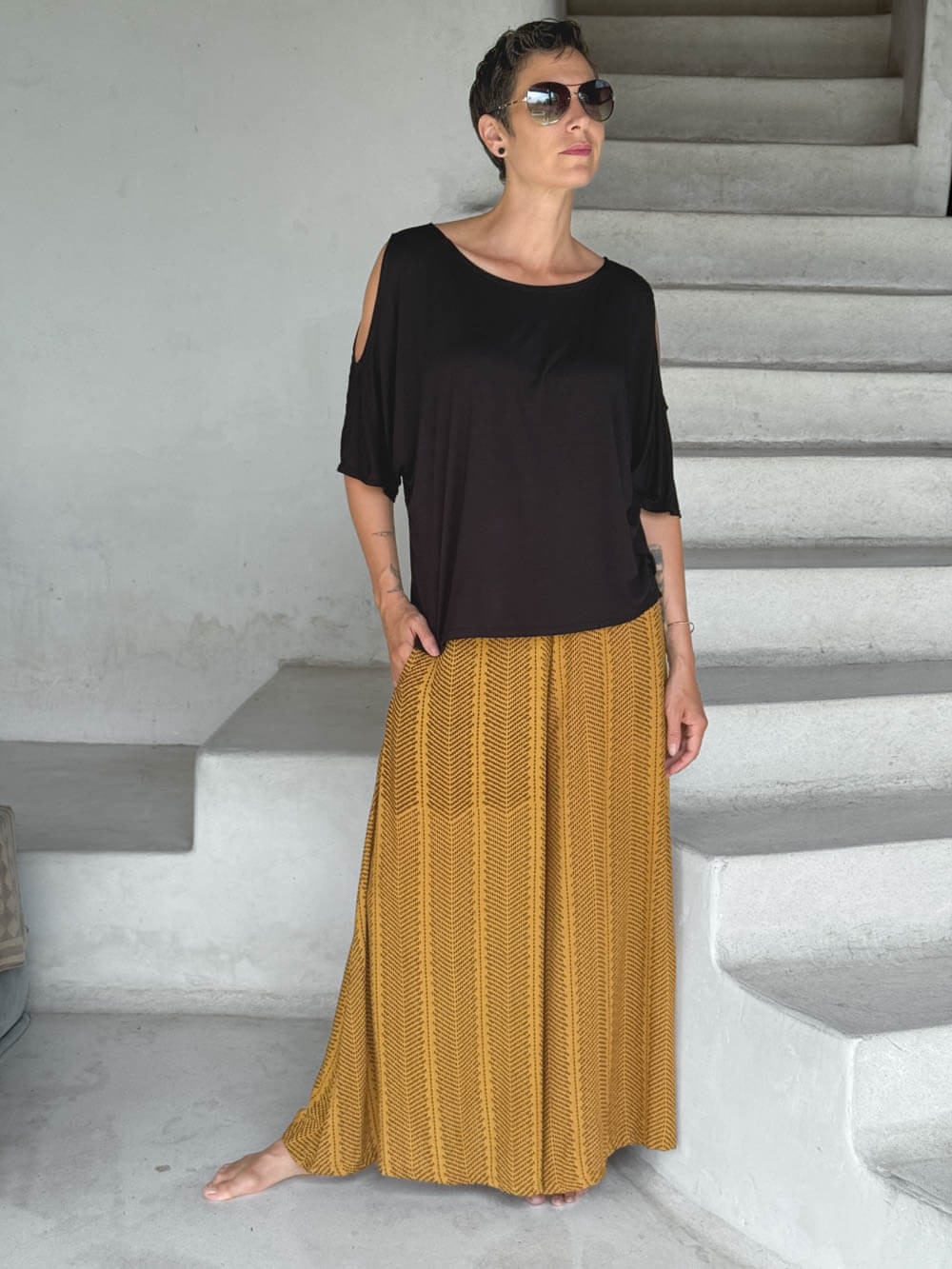 caraucci loose one size peekaboo shoulder short sleeve black top #color_black
