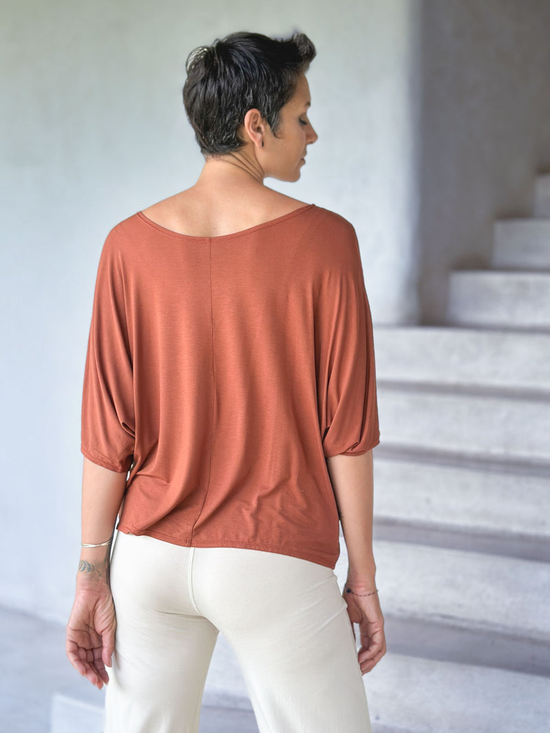 caraucci loose one size peekaboo shoulder short sleeve rust orange top #color_copper