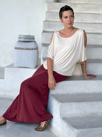 caraucci loose oversized peekaboo shoulder short sleeve cream top #color_cream