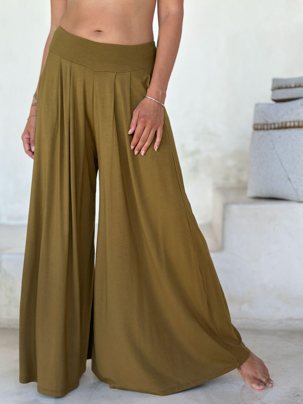 caraucci high waisted wide leg gold flare pants with side pockets #color_brass