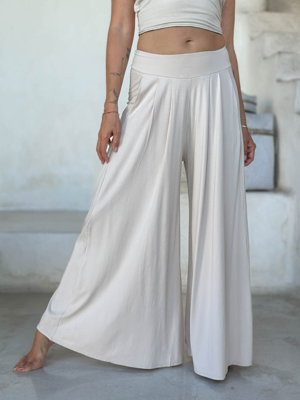 caraucci high waisted wide leg cream flare pants with side pockets #color_cream