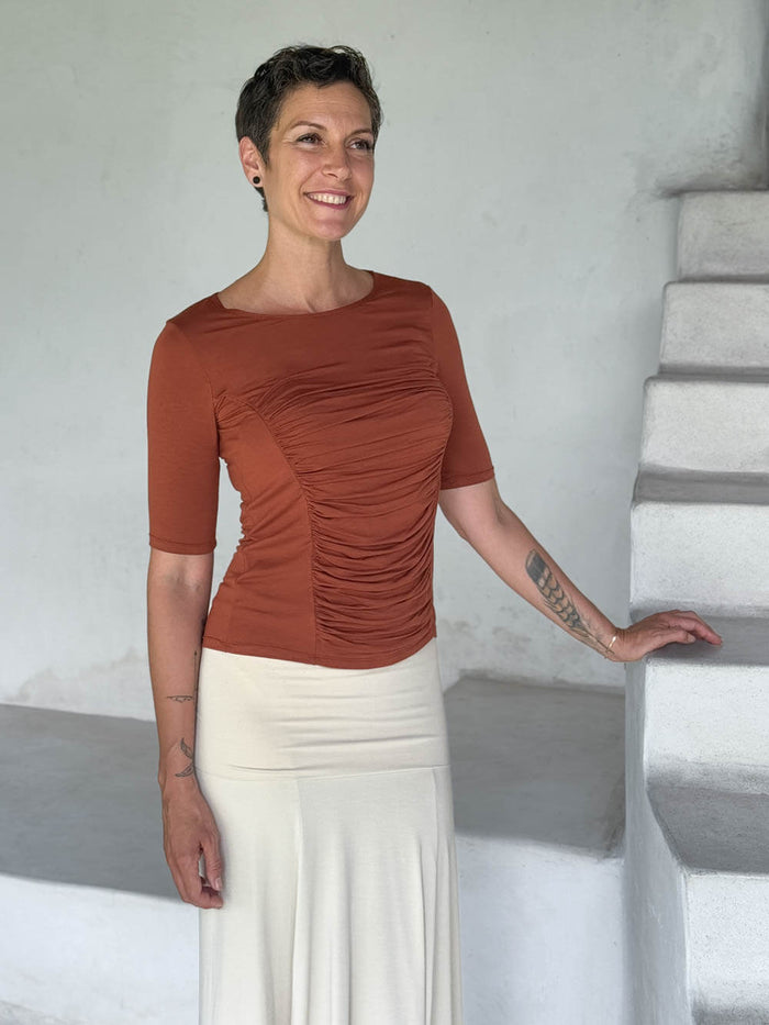caraucci jersey round neck fitted short sleeve orange top #color_copper
