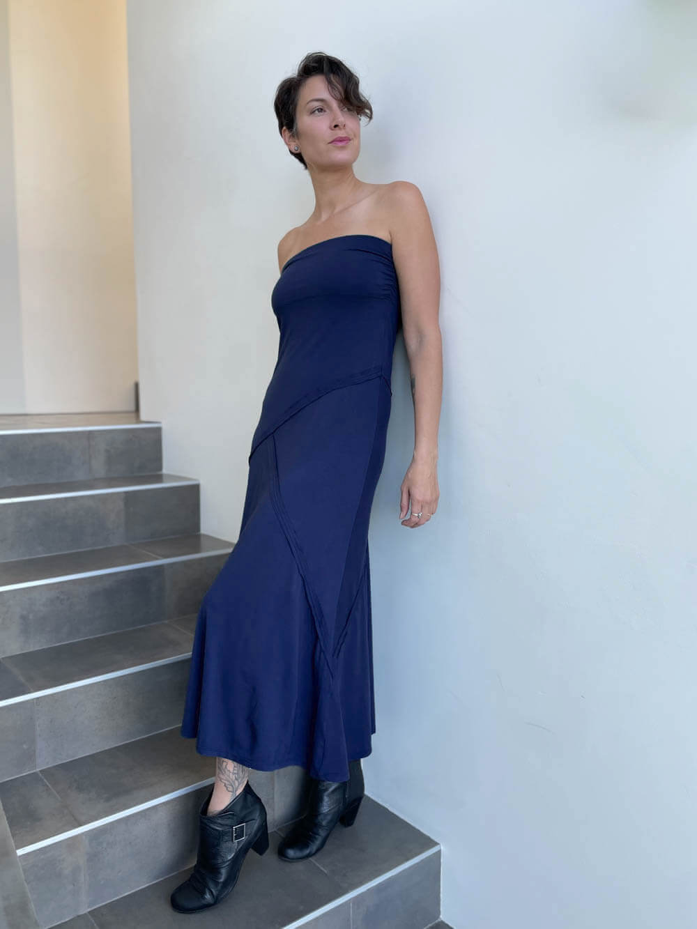 women's plant based stretchy rayon jersey navy blue maxi skirt shown as a dress #color_navy