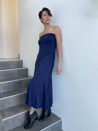 women's plant based stretchy rayon jersey navy blue maxi skirt shown as a dress #color_navy