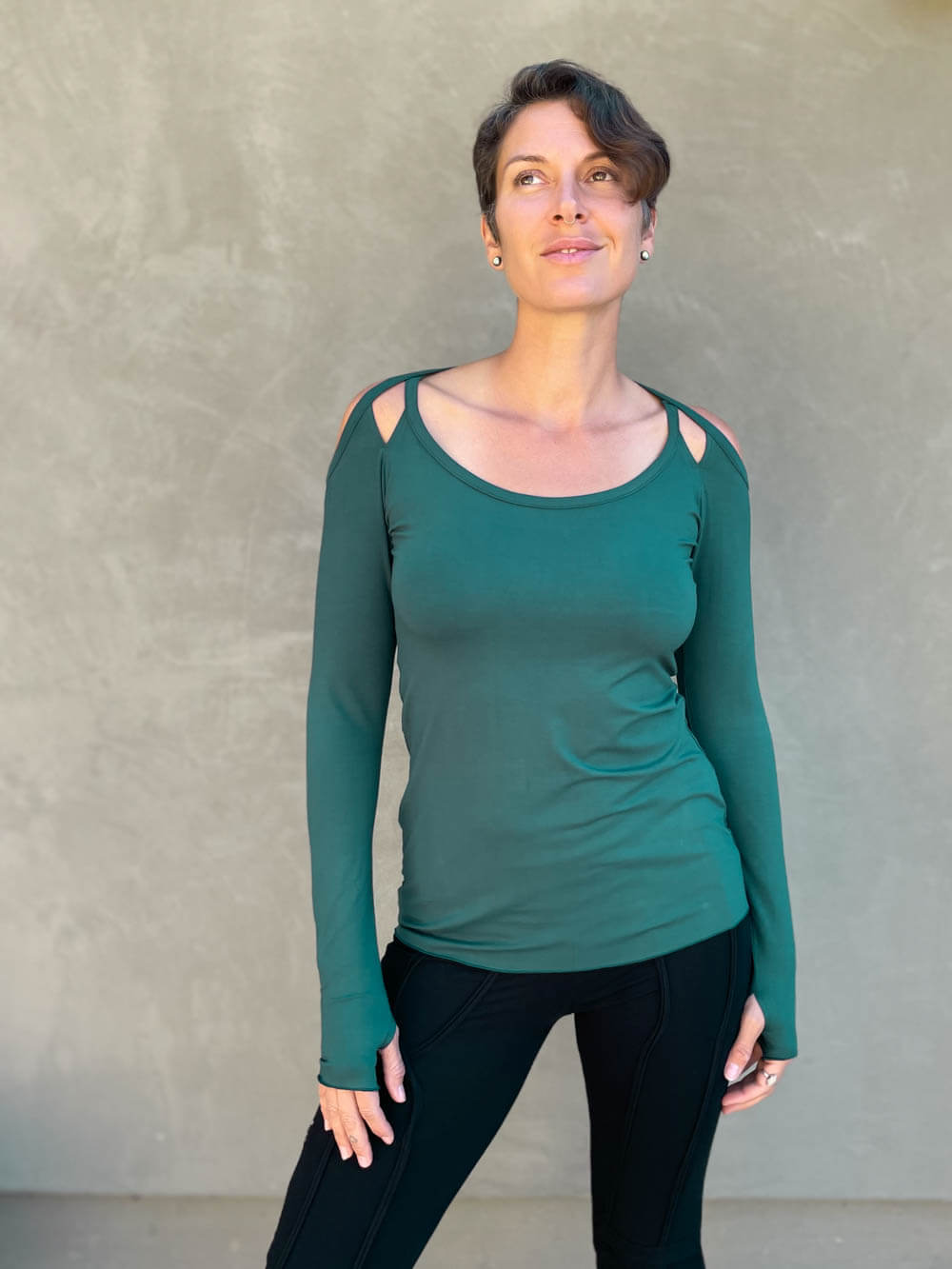 women's plant based stretchy rayon jersey long sleeve peekaboo shoulder jasper green top with thumbholes #color_jasper