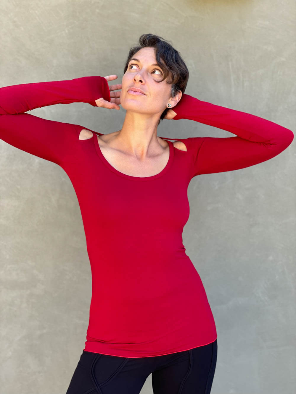 women's plant based stretchy rayon jersey long sleeve peekaboo shoulder red top with thumbholes #color_red